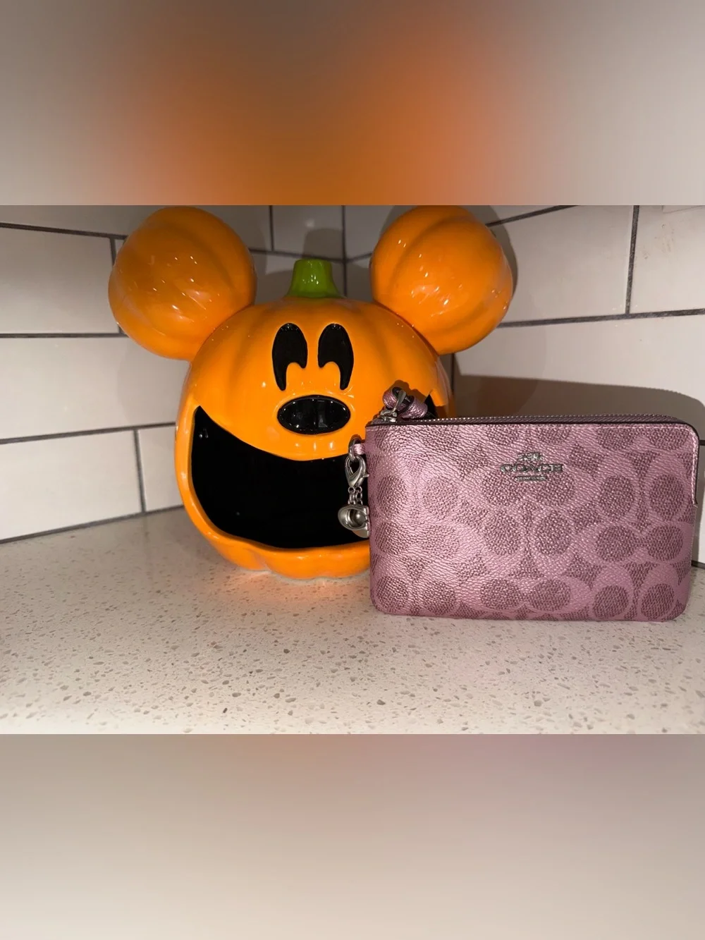 Metallic pink coach wristlet